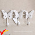 Triple blanco antiguo metal mariposa ganchos para la pared